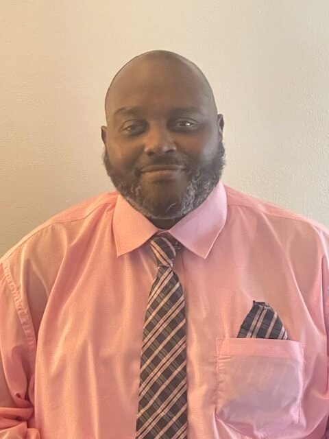 my pic1 black man in a colorful dress shirt and tie